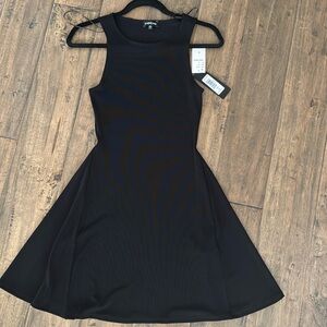 Black brand new BEBE mini dress sleeveless 36” nwt w/stretch